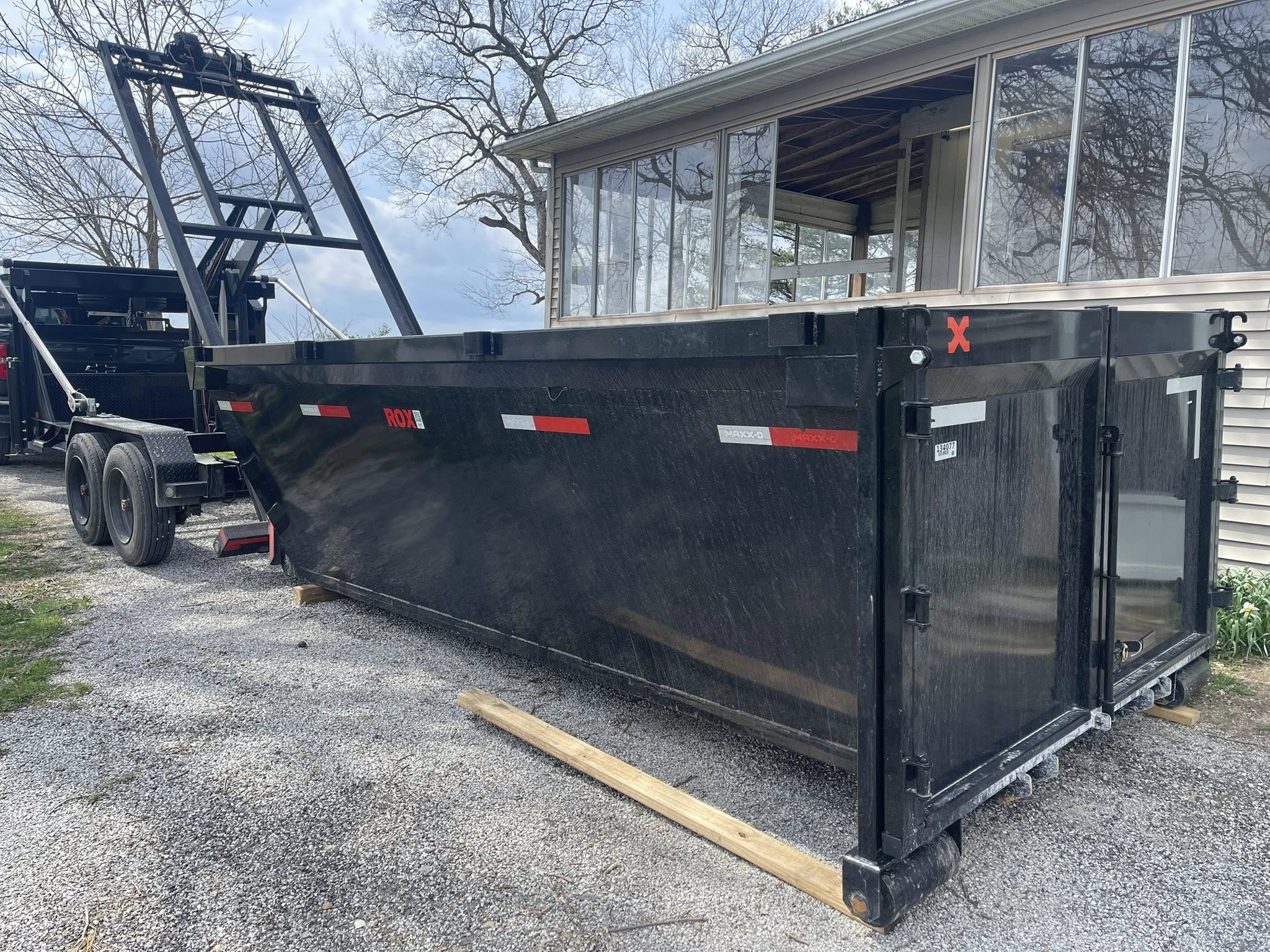 Residential dumpster rental in a Westerville, OH driveway during a home cleanout